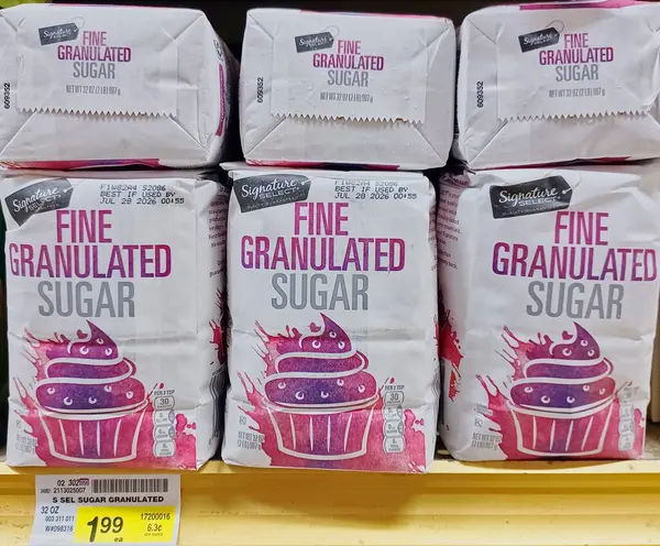 stock image Houston, Texas USA 09-01-2024: Fine granulated sugar bags Signature Select brand name supermarket shelf.