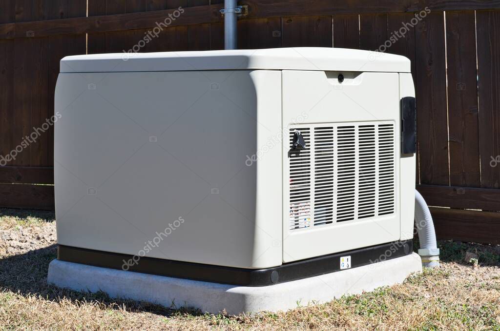 Standby home generator set in residential backyard, emergency backup power supply electricity generation.