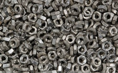 Metal fındıklar dağınık mekanik donanım bağlayıcılar makine parçaları çalışma araçları.