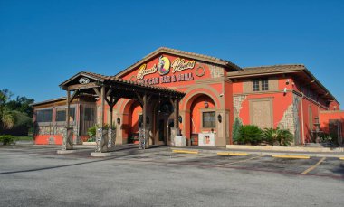 Houston, Texas USA 06-22-2025: Spanish Flowers Mexican bar and grill restaurant storefront exterior local diner.