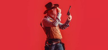 American cowboy. Cowboy wearing hat. American bandit in mask, western man with hat. Man wearing cowboy hat, gun. West, guns.