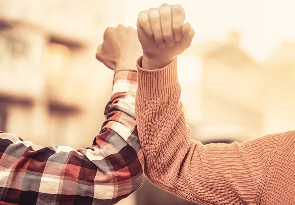 stock image Coronavirus, illness, infection, quarantine, COVID-19. Elbow bump. Bump elbows. Friends shaking elbows outdoors Elbow greeting style