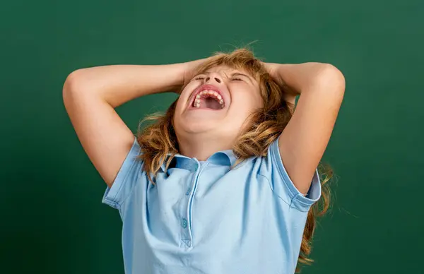 stock image Angry little boys with sad expressions, screaming, crying, cry. Child shouting. Little boy is screaming, crying a lot. Childrens whims, tantrums.