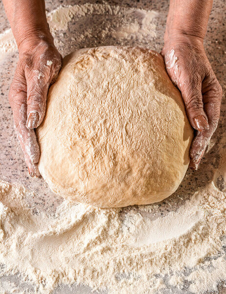 Making dough by male hands at bakery. Food concept. Hands dough.