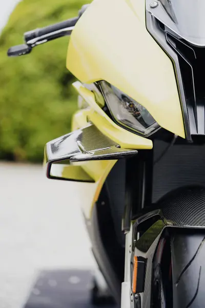 Front view of aerodynamic flaps or wings on a modern sports motorcycle.