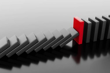 Düşmeyi durduran güçlü bir domino taşı. Çözüm ve strateji kavramı. Yüksek kalite fotoğraf