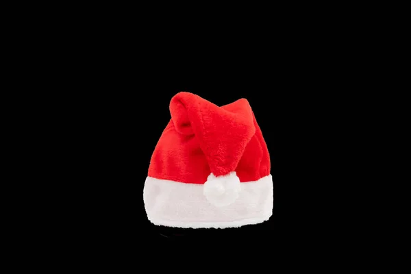 Czerwono Biały Świąteczny Kapelusz Czarnym Tle Santa Claus Czapka Zwykłym — Zdjęcie stockowe