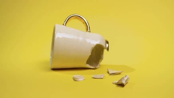 Broken Tea Cup Isolated Yellow Background Cracked Coffee Mug Fragile — Stok video