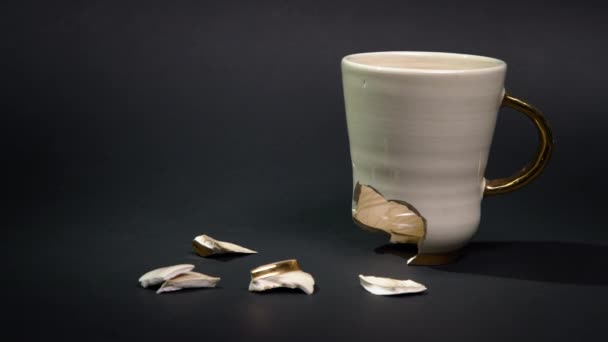 Broken Tea Cup Isolated Black Background Cracked Coffee Mug Fragile — Video Stock