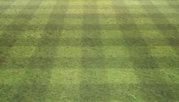 サニーサッカーやラグビー人工芝フィールドの背景 — ストック写真