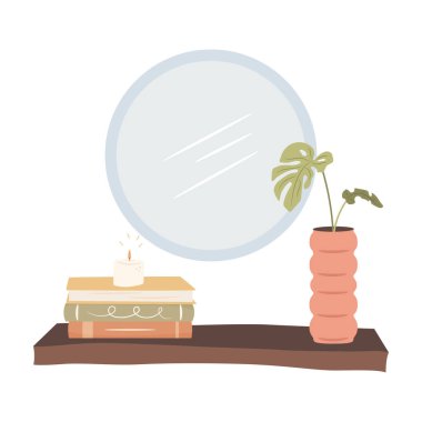 Rahat bir ev. Ahşap raf kitap yığını ve yanan mum. Sıcak sonbahar günleri konsepti.