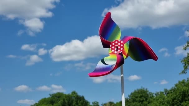 Pinwheel Front Blue Sky White Clouds Sunny Day — Stock Video