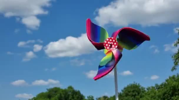 Colorful Pinwheel Toy Blue Sky White Clouds — Stock Video
