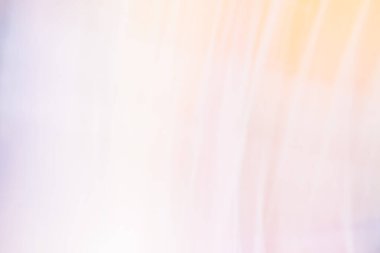 Soyut bulanık açık krem pembe arka plan, eğimli, sönük ışık ve gölge. Arkaplan