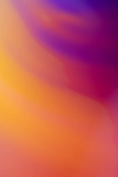 Abstract image with gradient colors. Colors vary from deep purple to bright orange. The image has a smooth texture and the colors blend seamlessly into each other. The image has a dreamy and ethereal mood.
