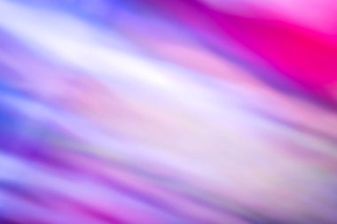 Menekşe leylak tonlarında odaklanmış ışık çizgileri olan soyut bir arkaplan. Renkli bir arkaplan. Arkaplan