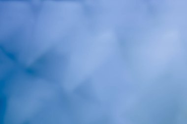 Odaklanamayan ışıklar, gölgeler ve eğimli vuruşlarla soyut puslu mavi arkaplan. Arkaplan