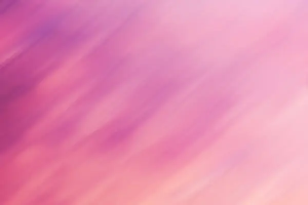 stock image The image presents an abstract background with a smooth gradient that flows from bright pink to deep purple hues. This gives a dynamic and aesthetic visual effect.