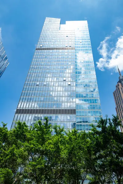 Stock image commercial building under blue sky at vertical composition