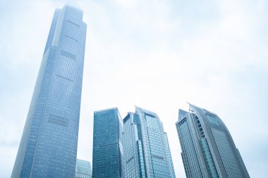 commercial buildings in a cloudy day horizontal composition