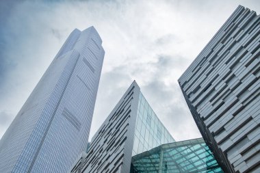 commercial buildings in a cloudy day horizontal composition