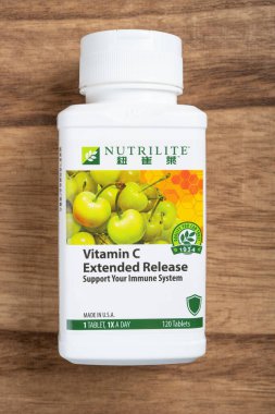 ZhongShan China-June 2 2024:bottle of Nutrilite Vitamin C tablets. clipart