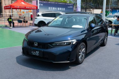 ZHONGSHAN GUANGDONG Çin - 21 Mart 2025: koyu mavi Honda Civic arabası.
