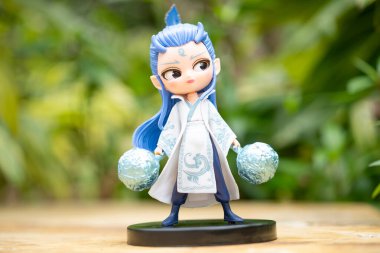 ZhongShan GuangDong Çin-28 Mart 2025: Nezha 2 filminin ana karakteri, açık havada yatay kompozisyonda oyuncak bebek besteliyor..