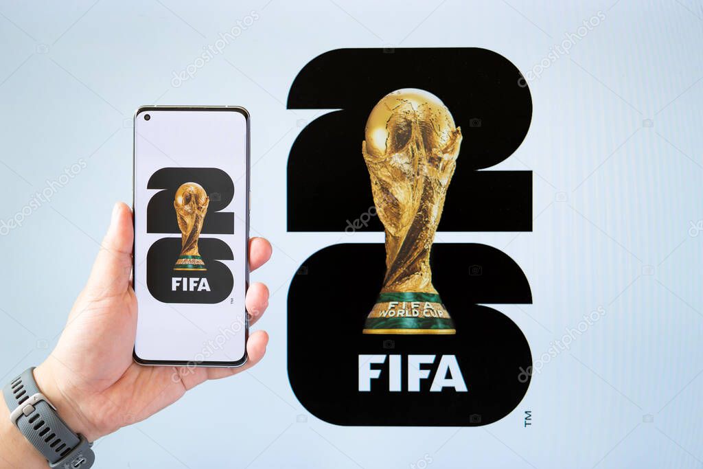 ZHONGSHAN China-June 8 2025: mobile with 2026 World Cup logo and a monitor with the same logo.