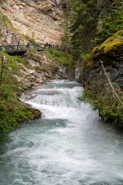 stock image Rushing teal water through Johnston Canyon in the summer - Banff National Park Canada