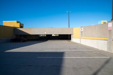 Cocoa Beach, Florida - December 29, 2022: Parking ramp upper floor, uncovered, with many available spaces