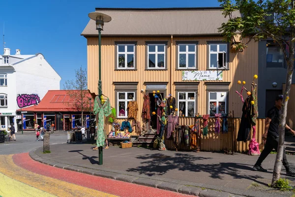 stock image Reykjavik, Iceland - July 10, 2023: Eclectic gift shop selling merchandise and Mama Restaurant, along the famous Rainbow Road (Laugavegur) in the capital city