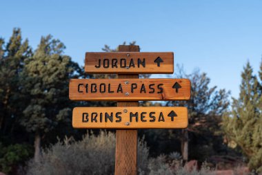 Direction signs for hikers in Sedona - Jordan, Cibola Pass and Brins Mesa trails clipart