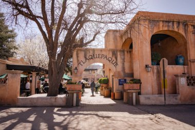 Sedona, Arizona - March 10, 2024: Shoppers browse through the galleries and shops of Tlaquepaque clipart