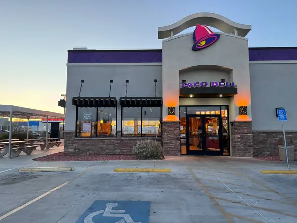 stock image Page, Arizona - March 8, 2024: Outside of a Taco Bell Fast food restaurant at sunset