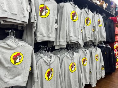 Temple, Texas - June 28, 2024: Buc-Ees gas station and retail travel center store sweatshirts and hoodies with the logo clipart