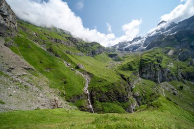 Scenery on the Oeschinensee Lake hike in Switzerland, near Kandersteg in the Swiss Alps, very rocky terrain clipart