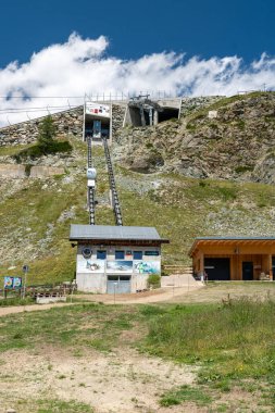 Zermatt, Switzerland - July 27, 2024: Funicular shuttle tram visitors can use to visit Leisee Lake, Sunnegga, Rothorn clipart