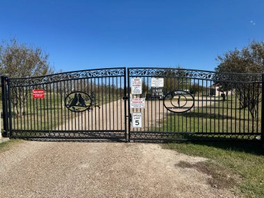 Waco, Texas - November 11, 2024: The gate at the entrance to the Branch Davidian Memorial site compound clipart