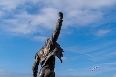 Montreux, Switzerland - December 11, 2024: Famous statue of Freddie Mercury, the British singer of Queen, on the waterfront of Lake Geneva in Montreux, Switzerland clipart