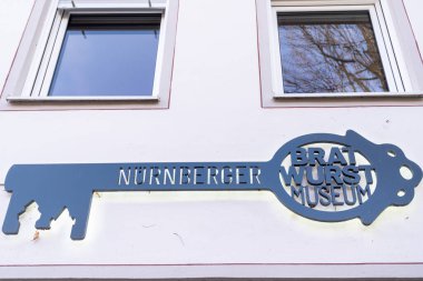 Nuremberg, Germany - December 4, 2024: Sign for the Nurnberger Bratwurst Museum in old town Nuremberg clipart