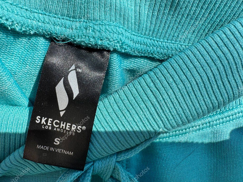 New Hope, Minnesota - April 5, 2025: Close up logo of Skechers brand clothing, casual athleisure