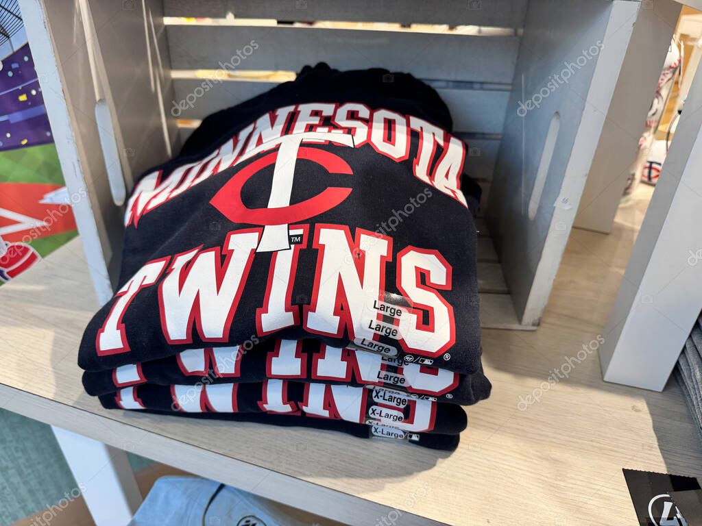 Minneapolis, Minnesota - April 11, 2025: Minnesota Twins MLB baseball themed shirts for sale at a gift shop