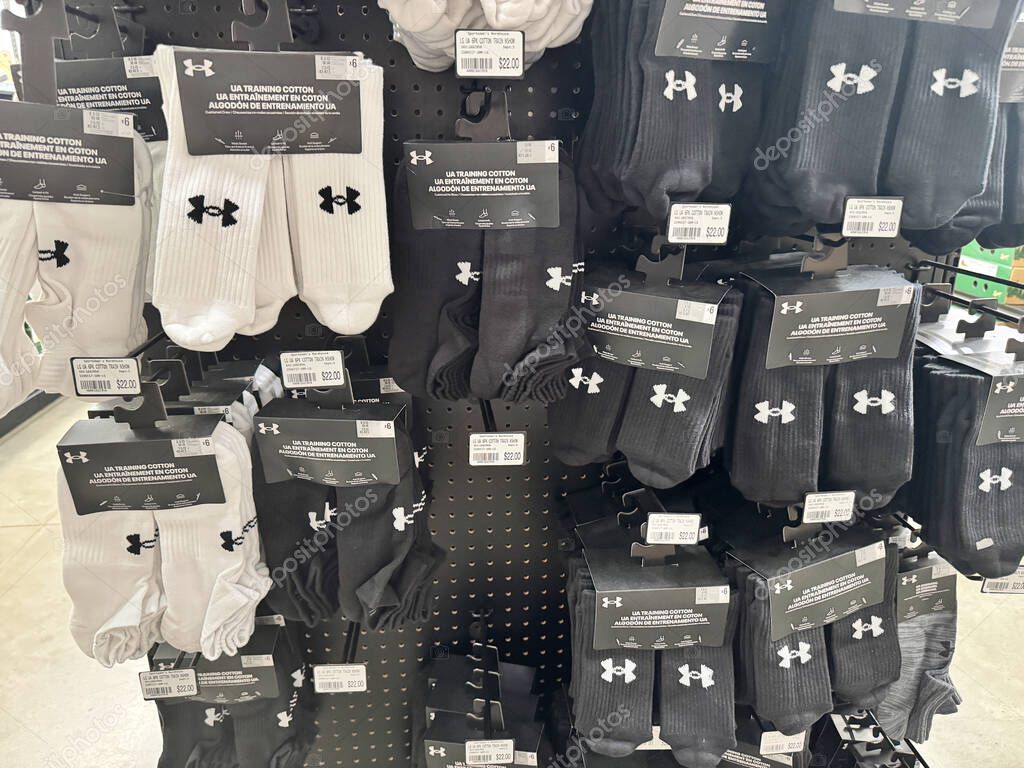Mesa, Arizona - June 13, 2025: Display of Under Armour socks at a retail store