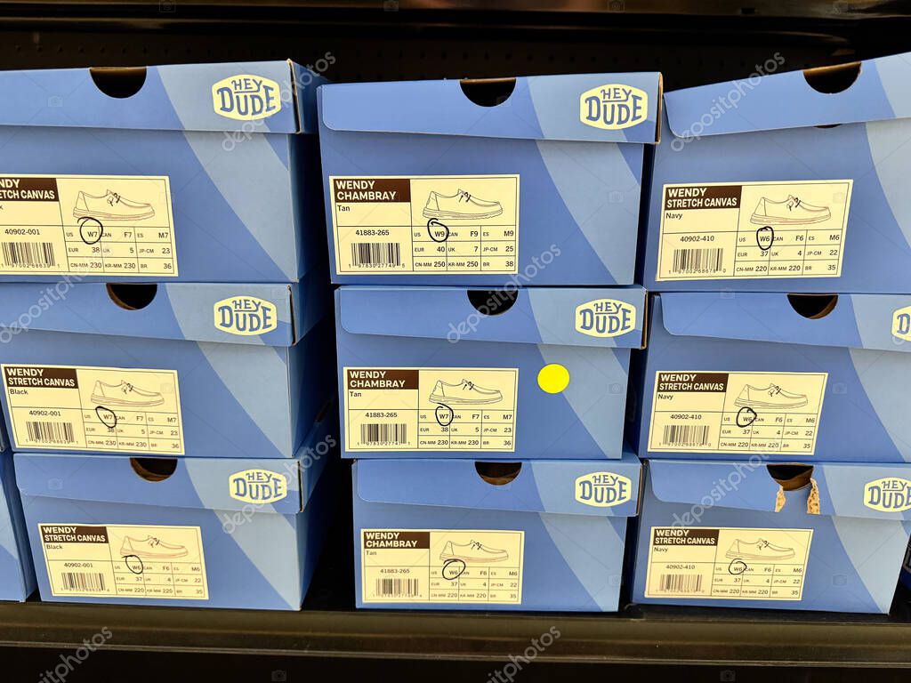 Mesa, Arizona - June 13, 2025: Boxes of Hey Dudes shoes on display at a retail store