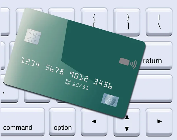 A generic mock credit card or debit card is seen  atop a computer keyboard in a 3-d illustration.