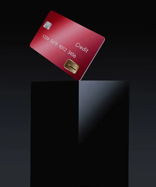 A red credit card or debit card is seen on top of a black box in a 3-d illustration.