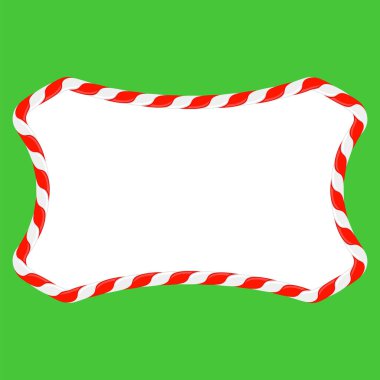 Yeşil arka planda kırmızı ve beyaz çizgili Noel şekeri çerçevesi. Xmas sınırı.