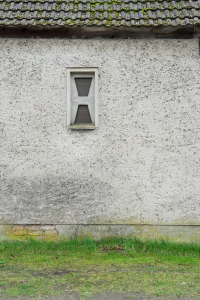 Gray Exterior Wall Washed Plaster Small Window Made Glass Blocks Stock Image