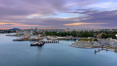 Victoria, British Columbia, seen from a docked cruise ship after sunset on a summer evening clipart